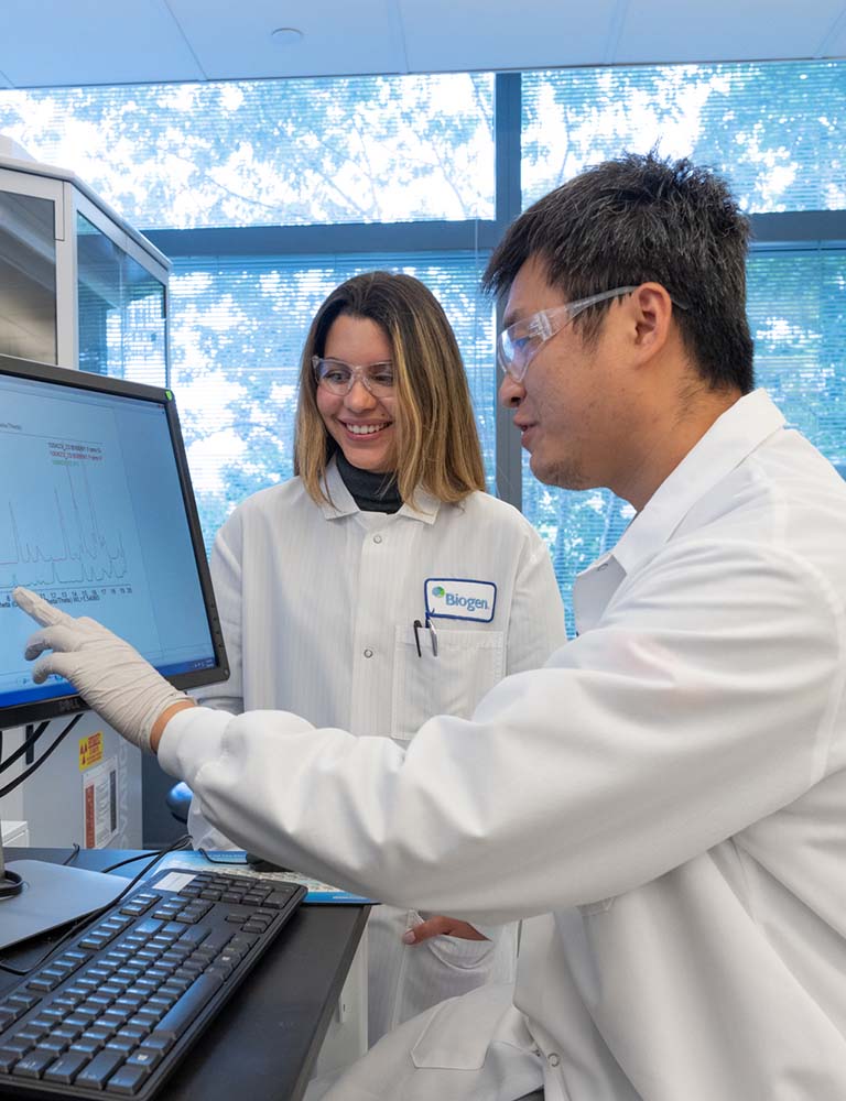Ph.D. Fellow being mentored by a Biogen scientist