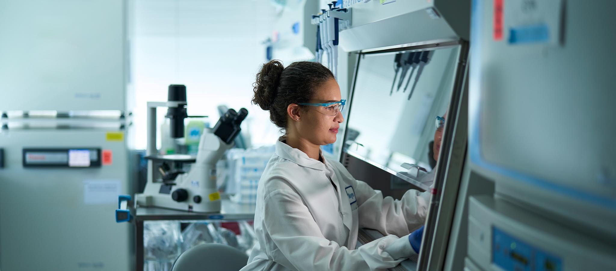 Biogen employee working in a lab