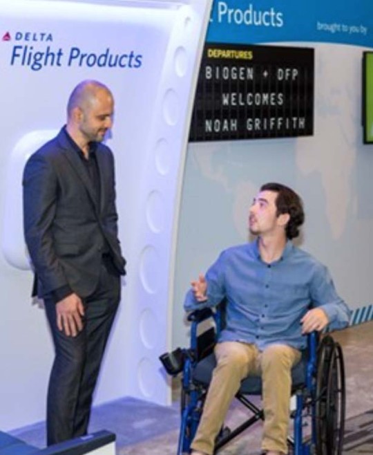 Delta employee and man in wheelchair