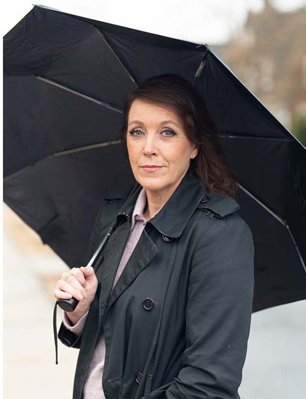 Monica with umbrella
