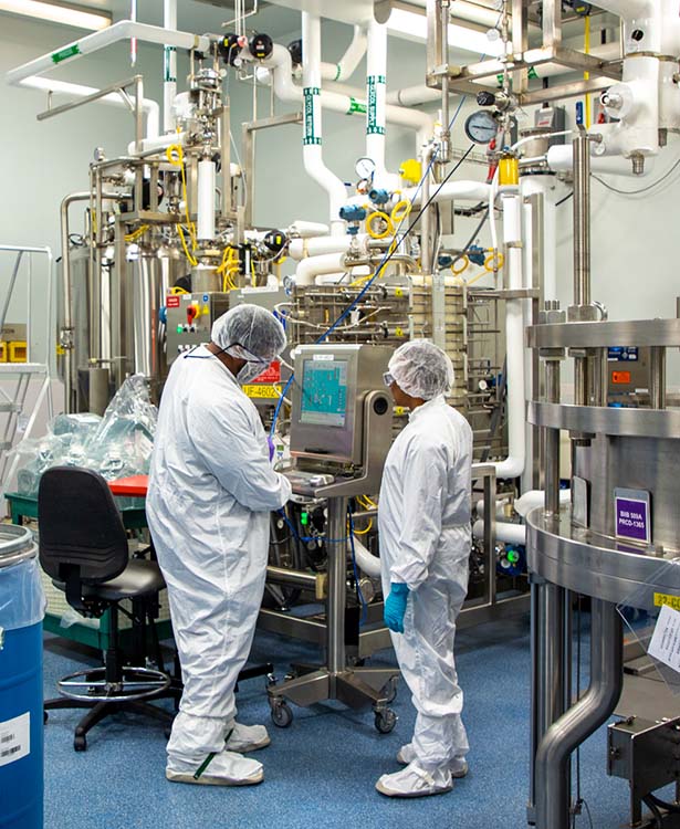 Biogen employees in a manufacturing facility