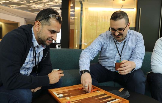 Two employees playing a game